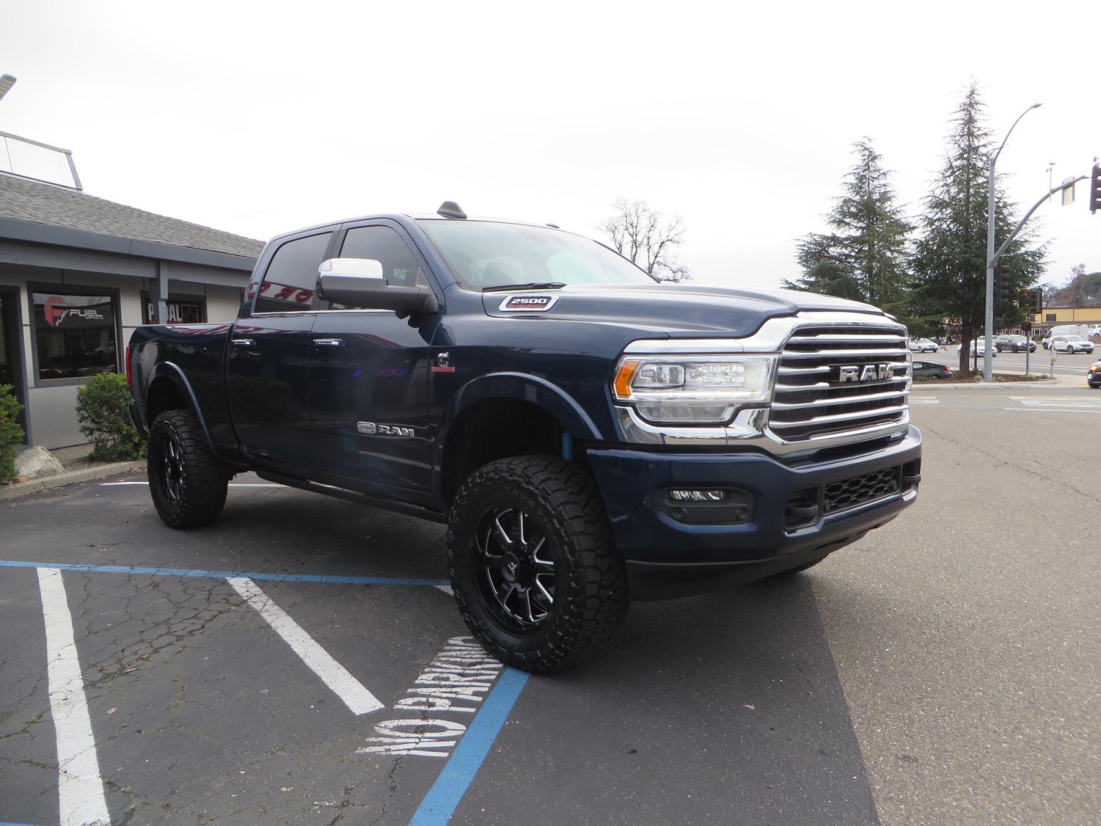 2022 BLUE /BROWN RAM 2500 Limited Longhorn Crew Cab SWB 4WD (3C6UR5GL7NG) with an 6.7L L6 OHV 24V TURBO DIESEL engine, 6A transmission, located at 2630 Grass Valley Highway, Auburn, CA, 95603, (530) 508-5100, 38.937893, -121.095482 - Beautiful Ram Limited Longhorn with a level kit, 20" Fittipaldi wheels, Toyo Open Country RT Trail tires, and a Demco 18K sliding 5th wheel hitch. - Photo #2